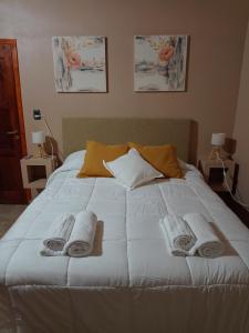 Postel nebo postele na pokoji v ubytování Las Casuarinas