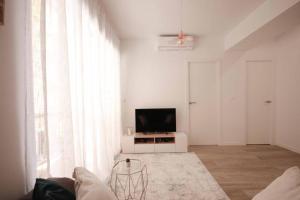Precioso apartamento a 10 min de la playa TV 또는 엔터테인먼트 센터