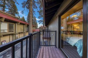 a balcony of a house with a wooden deck at Studio 2nd Floor Unit 217 Bldg B in Truckee