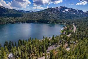 an aerial view of a lake with trees and mountains at Studio 2nd Floor Unit 217 Bldg B in Truckee