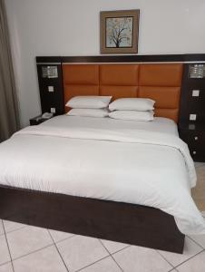 Postel nebo postele na pokoji v ubytování Cata Apartment Hotel And Spa