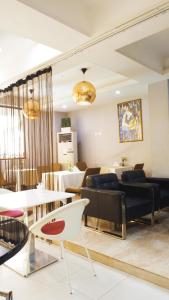 Posezení v ubytování Cata Apartment Hotel And Spa