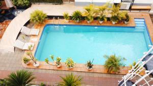 Bazén v ubytování Cata Apartment Hotel And Spa nebo v jeho okolí