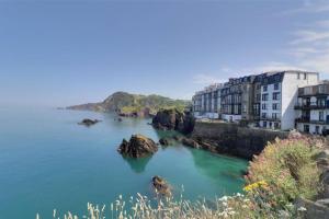 a view of a body of water with buildings at Sound of the Sea - Ilfracombe in Ilfracombe