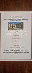 a piece of paper with a picture of a house at Bridge View House B&B and Restaurant in Kilcrohane