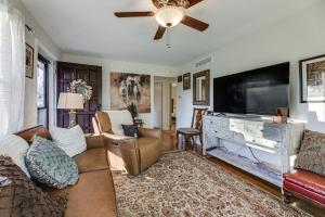 a living room with a large flat screen tv at Lovely Lexington Home 4 Mi to Downtown! in Lexington