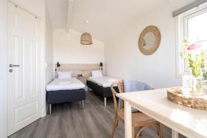 Postel nebo postele na pokoji v ubytování Visby Strandby