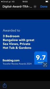 佩恩頓的住宿－3 Bedroom Bungalow with great Sea Views, Private Hot Tub & Gardens，电话上一个tpn应用程序的截图