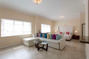 a living room with a couch and a table at Westover Arms Hotel in Miami Beach