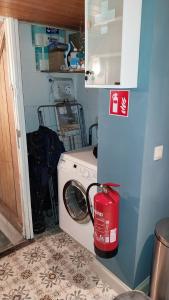 a washer and dryer in a small room at Dream@coast in Nieuwpoort