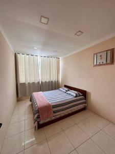 Postel nebo postele na pokoji v ubytování Casa em Tucuns
