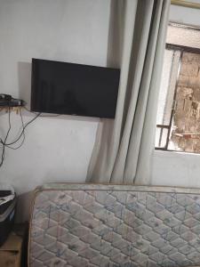 TV a/nebo společenská místnost v ubytování Casa