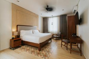 TV a/nebo společenská místnost v ubytování Kahal Hotel - Paseo Montejo