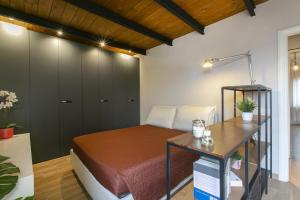 Tempat tidur dalam kamar di The best apartment in Rome!