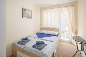 Posteľ alebo postele v izbe v ubytovaní 3 & 4 bedrooms apartment Simona
