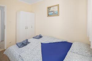 Posteľ alebo postele v izbe v ubytovaní 3 & 4 bedrooms apartment Simona
