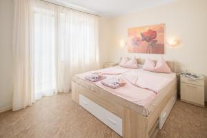 Posteľ alebo postele v izbe v ubytovaní 3 & 4 bedrooms apartment Simona