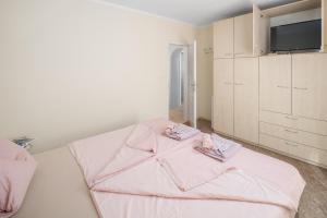 Posteľ alebo postele v izbe v ubytovaní 3 & 4 bedrooms apartment Simona