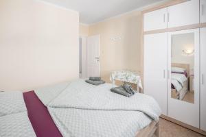 Posteľ alebo postele v izbe v ubytovaní 3 & 4 bedrooms apartment Simona