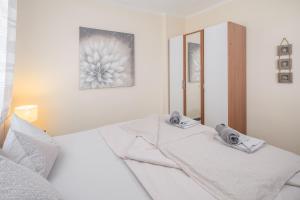 Posteľ alebo postele v izbe v ubytovaní 3 & 4 bedrooms apartment Simona