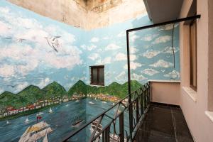 a room with a mural of a river at Nasip House in Istanbul