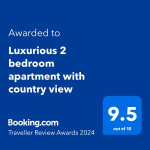 Ett certifikat, pris eller annat dokument som visas upp på Luxurious 2 bedroom apartment with country view