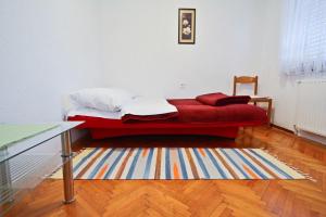 Postel nebo postele na pokoji v ubytování Korana Apartment