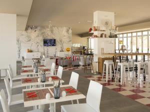En restaurang eller annat matställe på Pestana Alvor South Beach Premium Suite Hotel