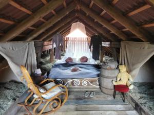 En eller flere senge i et værelse på Hay barn unique experience Visole + 31 billeder