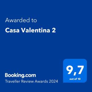 a blue text box with the words awarded to casa valentina at Casa Valentina 2 in Perugia