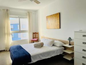 Giường trong phòng chung tại Casa Andalucia by SunshineClub
