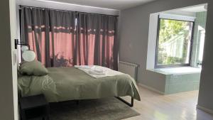 Легло или легла в стая в Casa Huilco- Panoramic Lake and Mountain Views