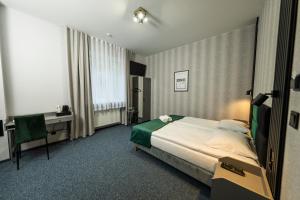 Posteľ alebo postele v izbe v ubytovaní Elegant Apartments