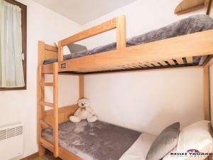 Appartement Vielle-Aure, 3 pièces, 6 personnes - FR-1-296-125 tesisinde bir ranza yatağı veya ranza yatakları