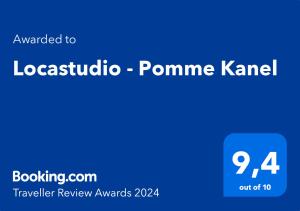 a blue screen with the textouched to kooshiniaprime k name at Locastudio - Pomme Kanel in Sainte-Anne