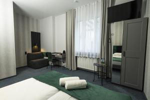 Posteľ alebo postele v izbe v ubytovaní Elegant Apartments