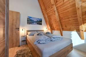 Ένα ή περισσότερα κρεβάτια σε δωμάτιο στο Apartments AVA +84 φωτογραφίες