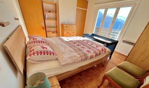 Ліжко або ліжка в номері Chalet La Louise avec vue imprenable