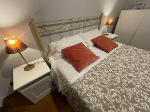 Postel nebo postele na pokoji v ubytování Paradise Rooms - Brignole Station