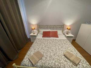 Postel nebo postele na pokoji v ubytování Paradise Rooms - Brignole Station