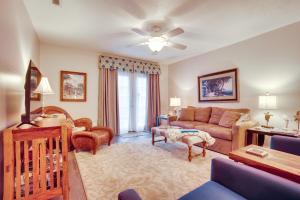 a living room with a couch and a table at Beaufort Home with Patio 3 Mi to Downtown! in Beaufort