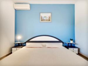 Posteľ alebo postele v izbe v ubytovaní Apartments Zizic