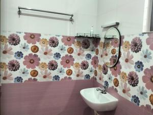 Koupelna v ubytování Devi Kripa Residency