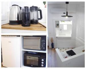 a kitchen with a blender and a microwave at Private house in the center near the Castle in Tournon-sur-Rhône