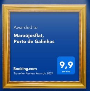 una imagen de un marco con fondo azul en Maraújosflat, Porto de Galinhas en Porto de Galinhas