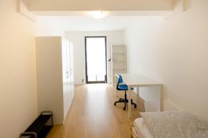 Postel nebo postele na pokoji v ubytování Residence Meljska