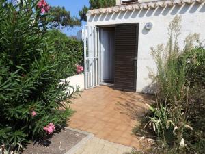 Vonkajšia záhrada v ubytovaní Résidence Héliovillage - VILLA 4 pers. CAP d'AGDE MAE-2834