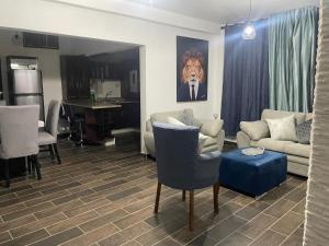 a living room with a couch and a table at Lovely and warming 3 bed in Morelia