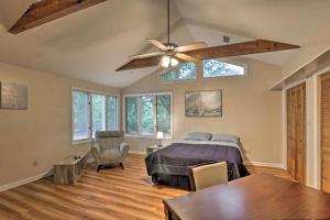 a bedroom with a bed and a ceiling fan at Escambia in Tallahassee