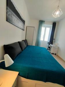 Кровать или кровати в номере Trieste LIVING